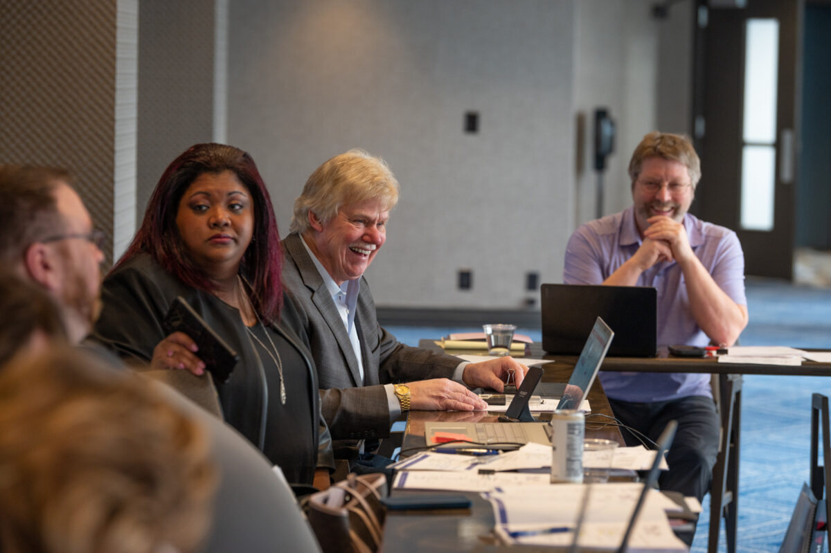 Incoming AKHLA board chair Terry Wanzer, center, shares a laugh during the annual retreat in January at the Sheraton Hotel and Spa. Secretary Tracy Morgan, left, and AKHLA president John Woodbury, right, look on. A new slate of directors was put in place during the meeting. Cred: Michael Dinneen/dinneenphoto.com